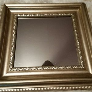 Pewter framed mirror